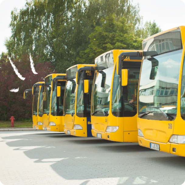 A row of bright yellow buses